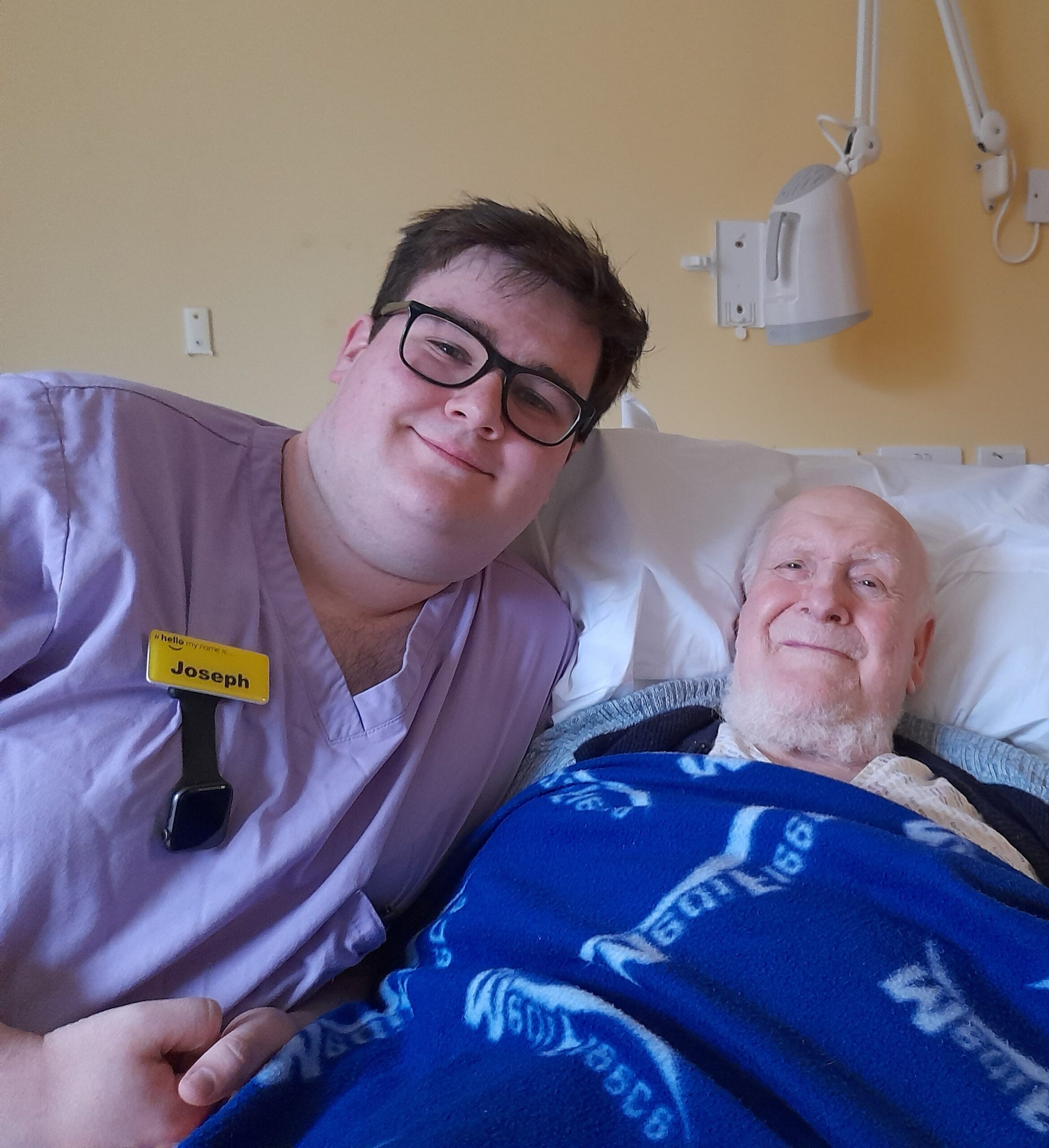 Hydration champion Joseph Bridger with patient Alan Hyde at Hawkhurst Hospital